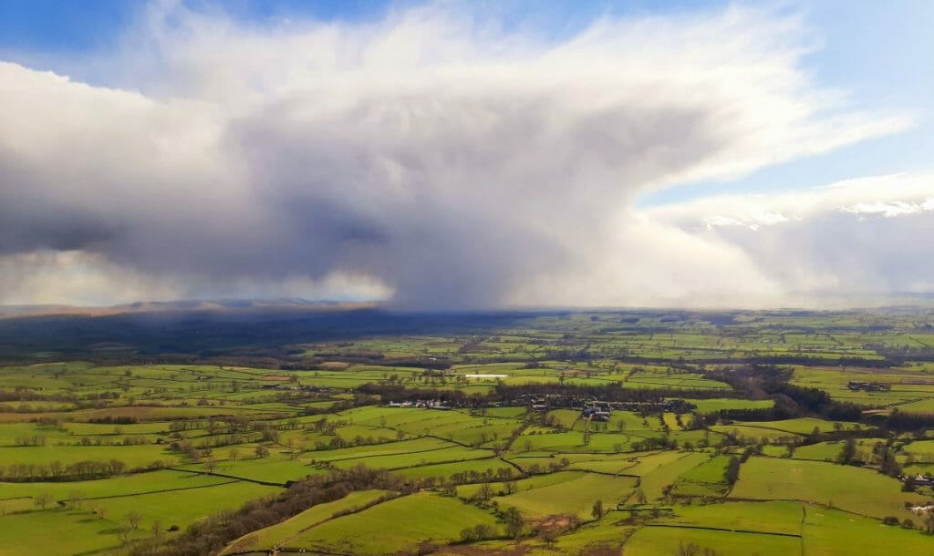 Cold April shower heading for Dufton Eden Valley by Alan Hinkes. Penrith and the Border is to benefit from a £10m fund to protect the natural environment.