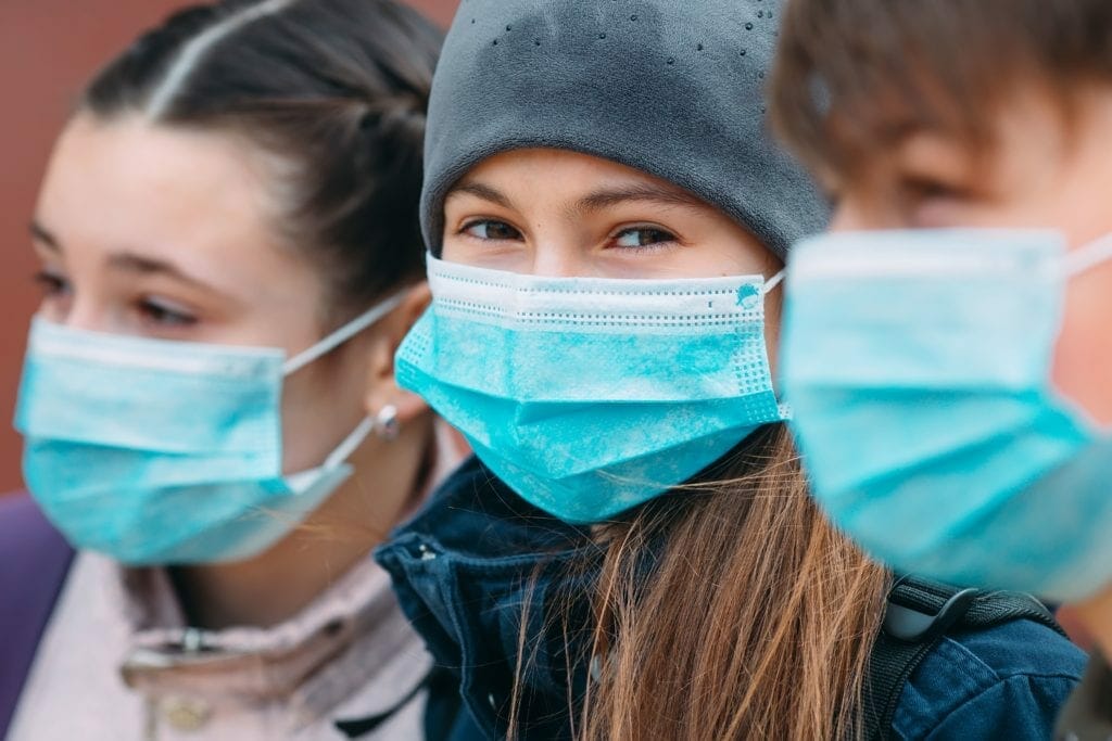 Pupils in Cumbrian secondary schools are again being told to wear face masks in communal areas as the county's public health team tackles a rapid rise in coronavirus cases.