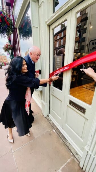 Mayor Charlie Shepherd and Dr. Deepa Apté of Ayurveda Pura London cut the ribbon at Inner and Outer Wellbeing 