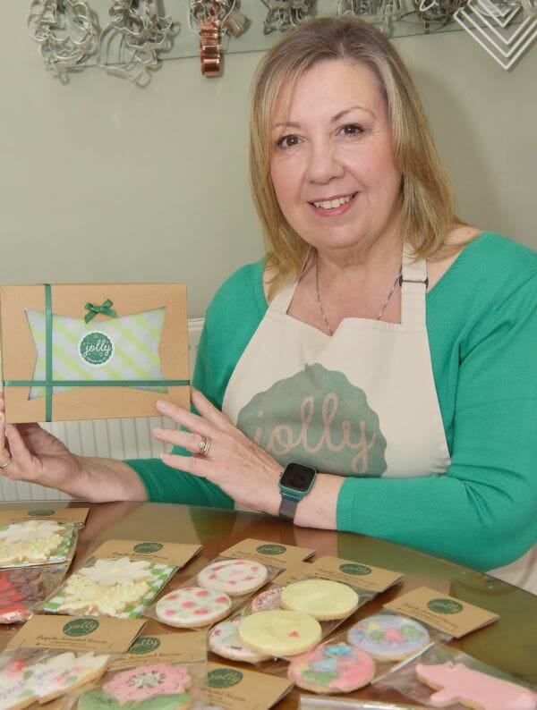 Woman holding box of  artisan biscuits