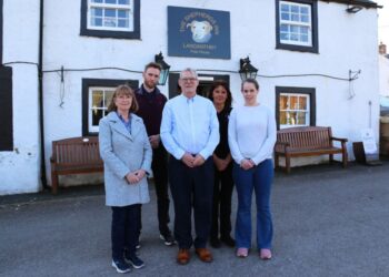 Pub reopens after car crashes into building